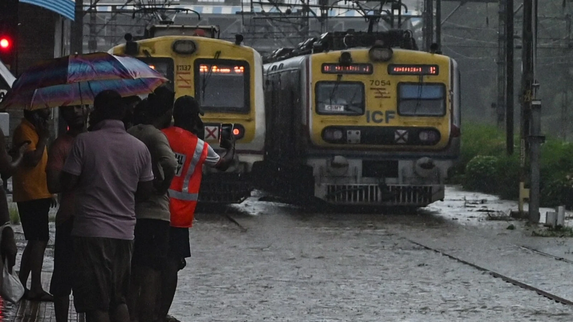 Mumbai Rain Havoc: IMD Issues Red Alert, Trains Hit, University Exams Postponed