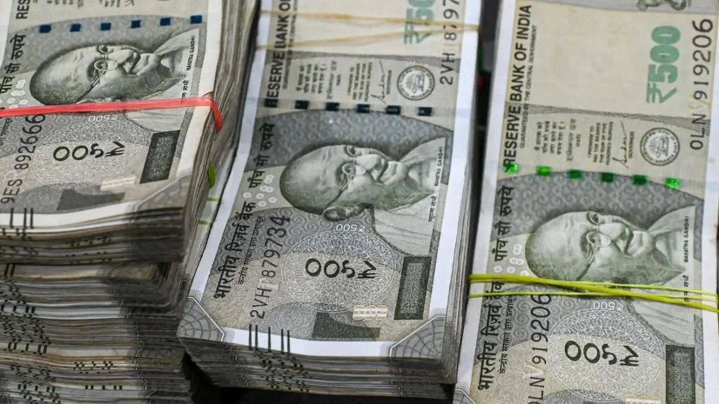 Rupee wavers amid merchant flows: A flat finish for the day.