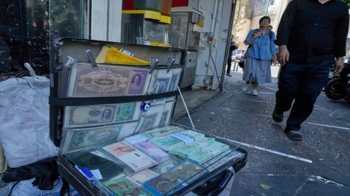 Iran Protests Flare as Currency Plummets to New Low