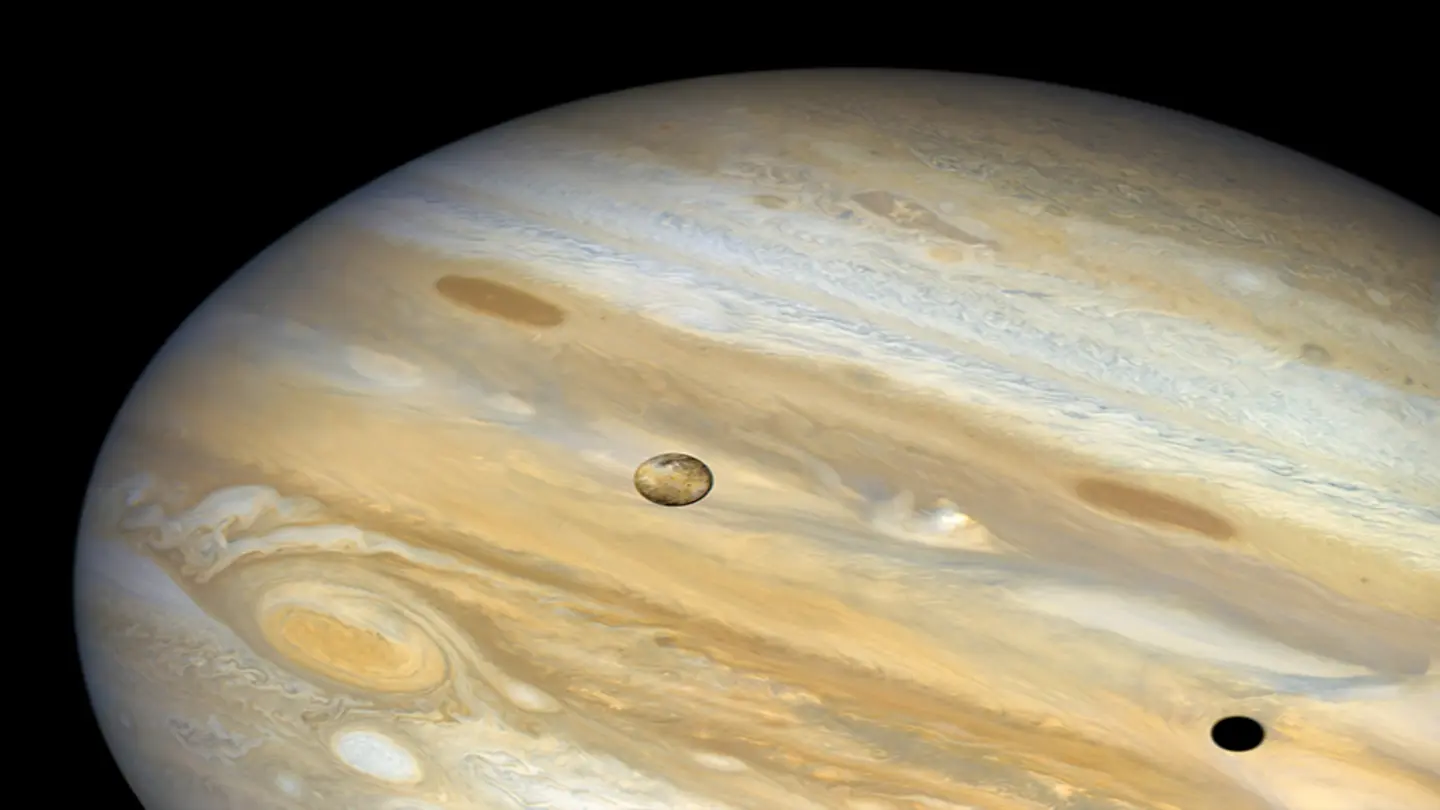 Proton Loss Near Jupiter’s Moon Io Linked to Atmospheric Interaction